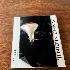 Costume jewelry-Silver ring with purple like color stone